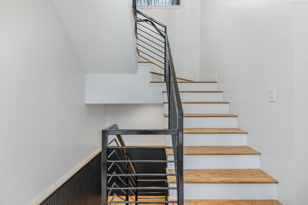 Interior staircase of Reynard custom home
